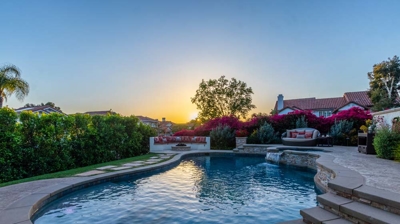 Outdoor pool at sunset Photo