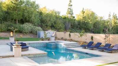 Backyard pool with attached spa Photo