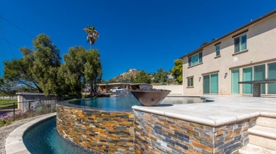 a pool's curved edges creating a serene atmosphere Photo