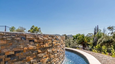 a pool with softly curved edges under the bright sun Photo