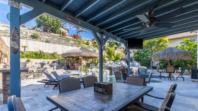 Tiki-inspired seating area with cozy chairs and tropical decor Photo