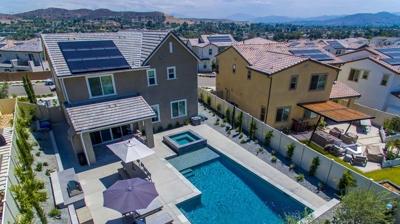 Rectangular pool nestled in a suburban backyard Photo