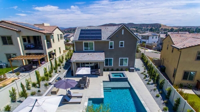 Inviting backyard escape with a rectangular pool Photo