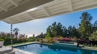 Serene suburban scene: rectangular pool and hot tub for leisure and relaxation Photo