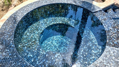 Interior view of circular tiled jacuzzi Photo