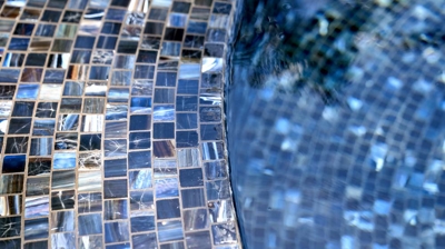 Close up view of pool tile in water Photo