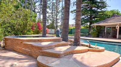 Stone steps leading up to the jacuzzi Photo