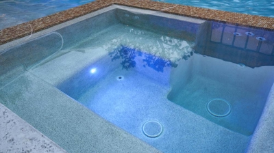 The interior of a jacuzzi with lights on Photo
