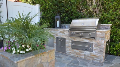 A built in barbecue with storage Photo