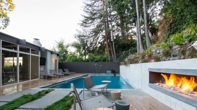 Suburban paradise: rectangular pool offering a serene retreat amidst lush foliage Photo