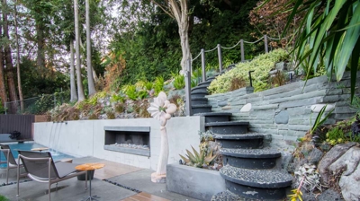 Lush backyard paradise: rectangular pool providing a cool escape in a suburban oasis Photo