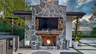 Outdoor cooking and dining space designed for relaxation and enjoyment Photo