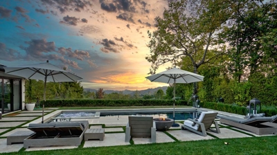 Rectangular pool and jacuzzi nestled in a tranquil suburban oasis Photo