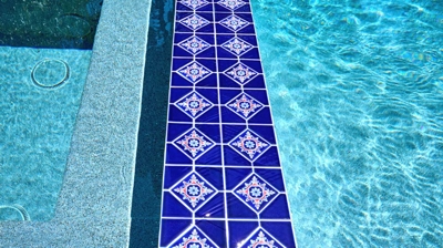 Interior of a pool with blue tile Photo