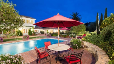 Stylish poolside furniture providing comfort and sophistication Photo