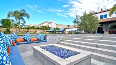 Custom sunken firepit area with bench seating Photo