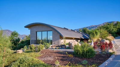 Front of lap pool building with landscaping Photo