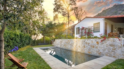 Small backyard pool with seating Photo