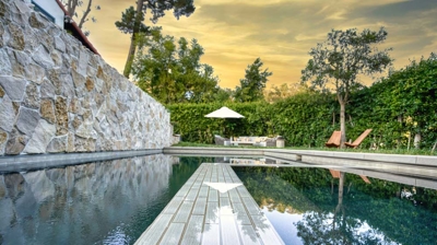 Intimate backyard with custom spa detail Photo