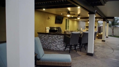 Alfresco lounge with cozy seating and hearth. Photo