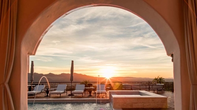 Exquisite residence complete with a lavish pool and artistic water features. Photo