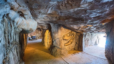 An awe-inspiring backyard grotto boasting fossilized marvels within its walls. Photo