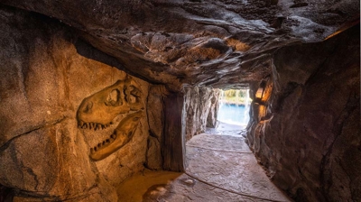 An amazing cave, complete with fossils in the walls, built in the backyard. Photo