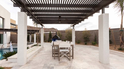 Outdoor table and chairs poolside Photo