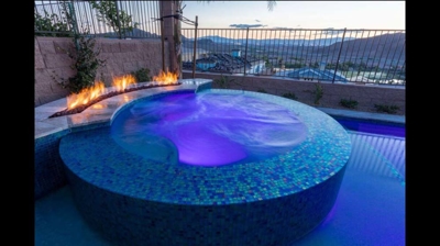 Infinity edge spa and fire feature Photo
