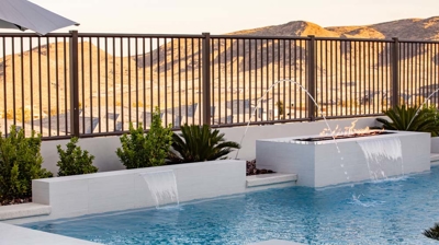 Pool with fire features and waterfalls Photo