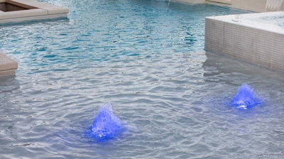 Illuminated water jet detail Photo