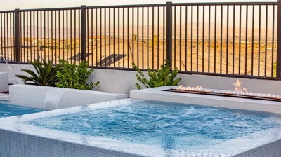 Infinity edge spa with fire feature Photo