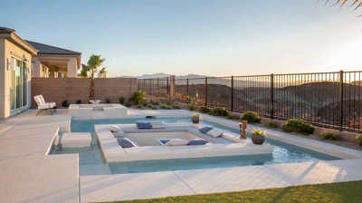 Backyard spa and pool with sunken seating area Photo