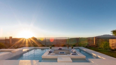 Backyard pool with sunken seating area Photo