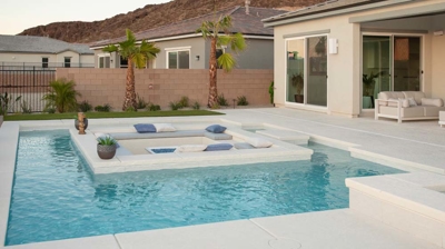Backyard pool and patio with custom sunken seating area Photo