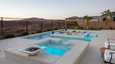 Custom pool and spa with water feature detail Photo