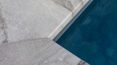 Stone pool edging detail Photo