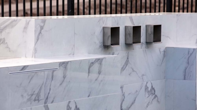 Custom masonry for pool wall Photo