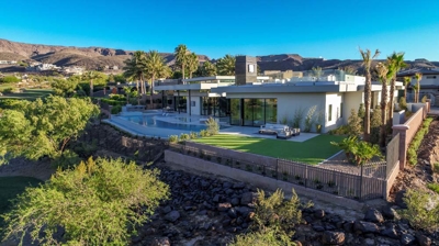 Aerial view of house and backyard pool Photo
