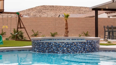 Backyard pool with custom spa Photo