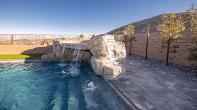 Pool steps and waterfall Photo