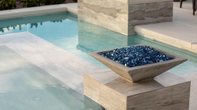 Fire bowl feature with pool Photo