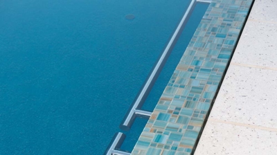 Unique poolside tilework Photo
