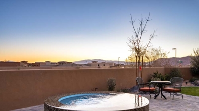 View of infinity edge spa and patio Photo