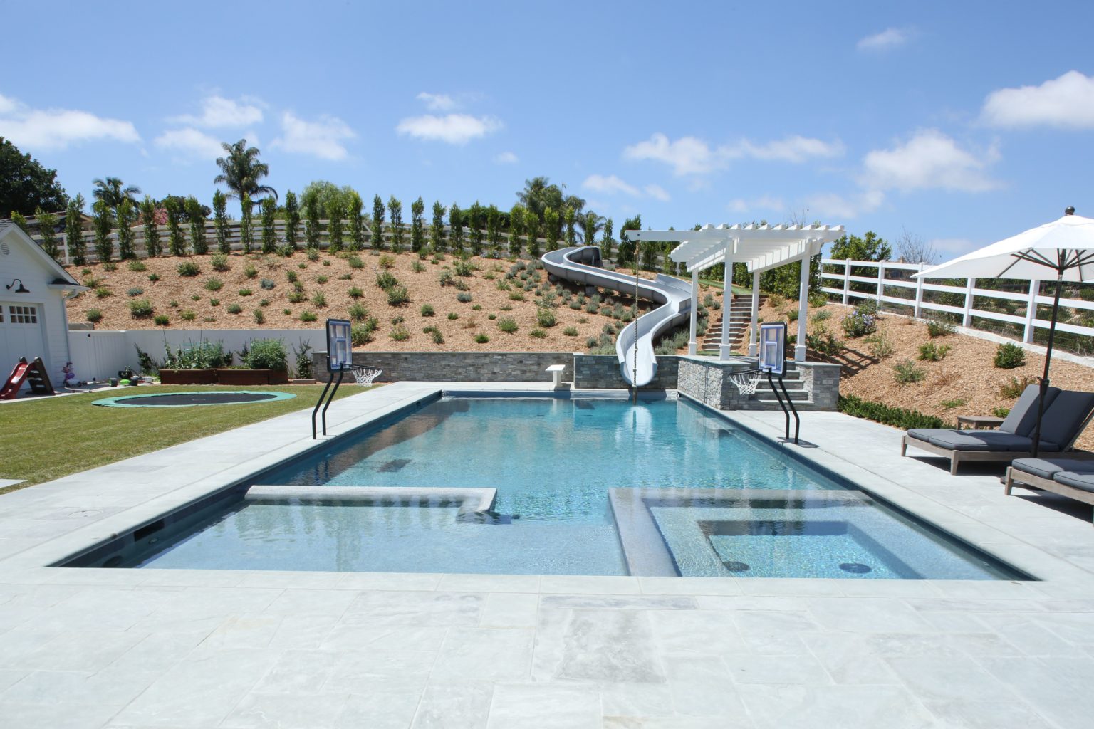 Swimming pool with slides