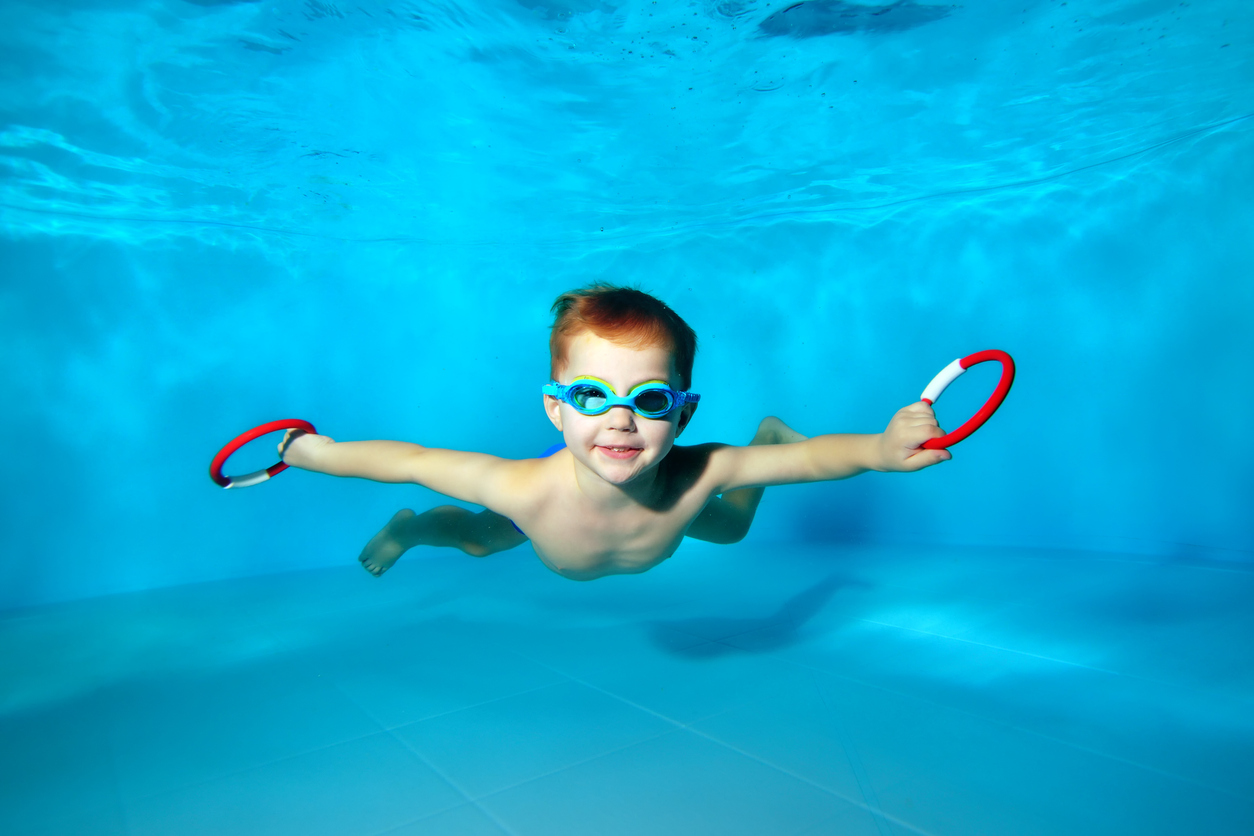 Baby playing underwater