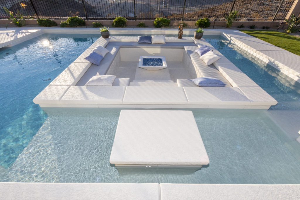 swimming pool with seats in the middle